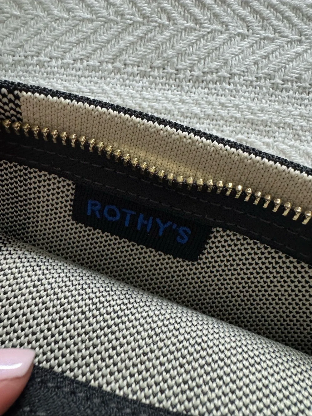 Rothy's Black & Cream Striped Canvas Wristlet